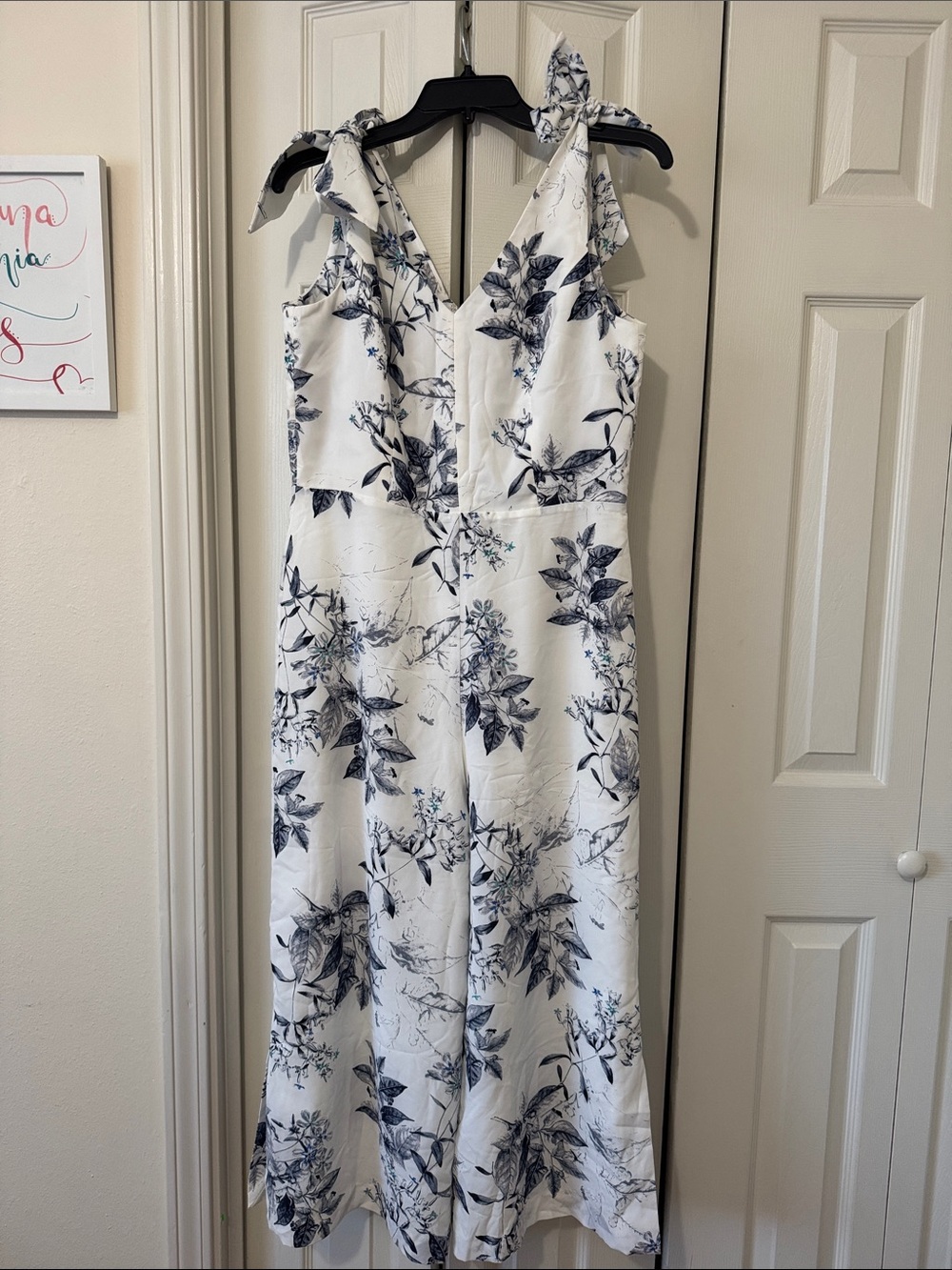 Alex Marie White Jumpsuit with Navy Floral Print and Tie Shoulders